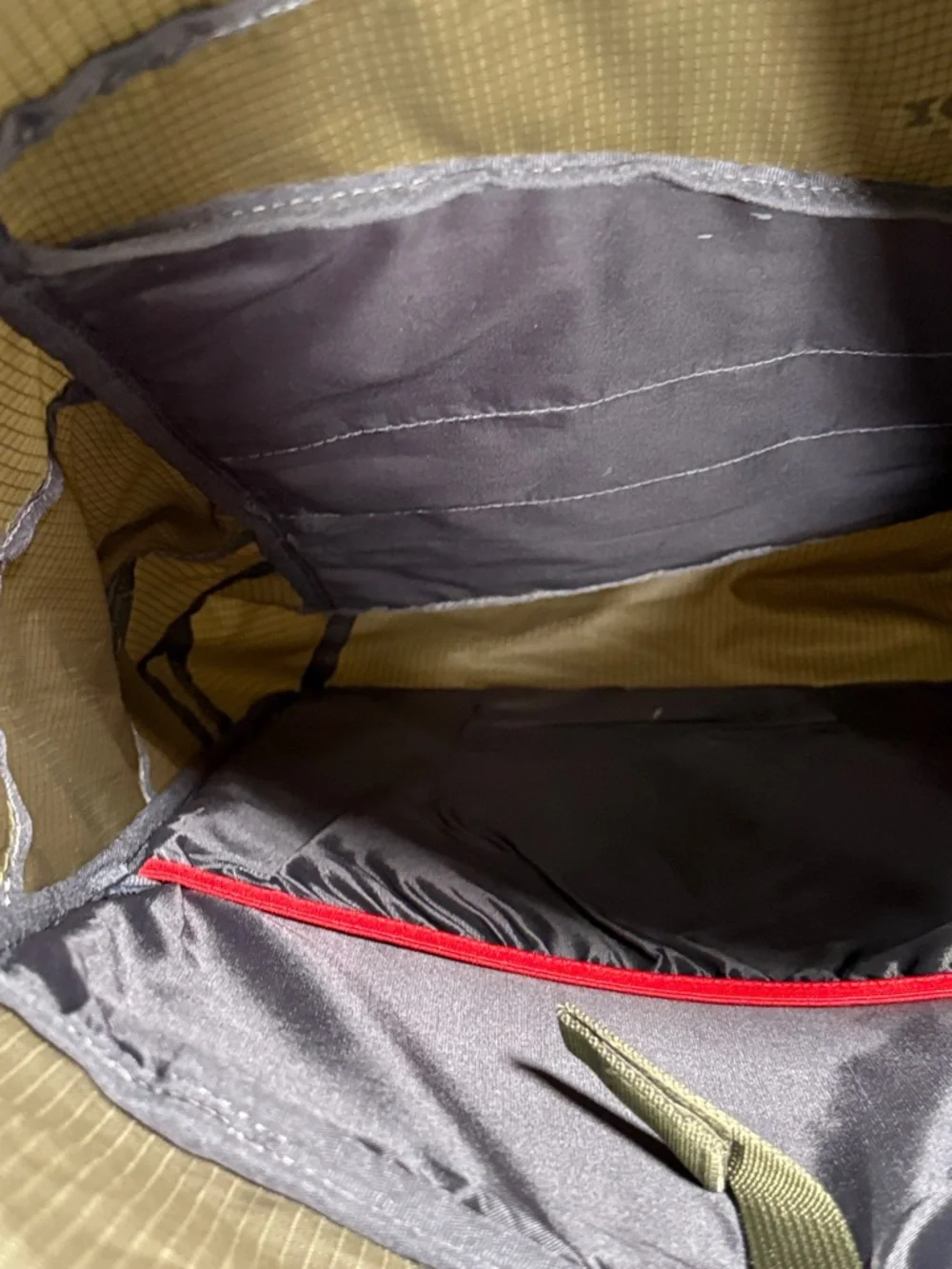 Outdoor Products green roll-top camping backpack